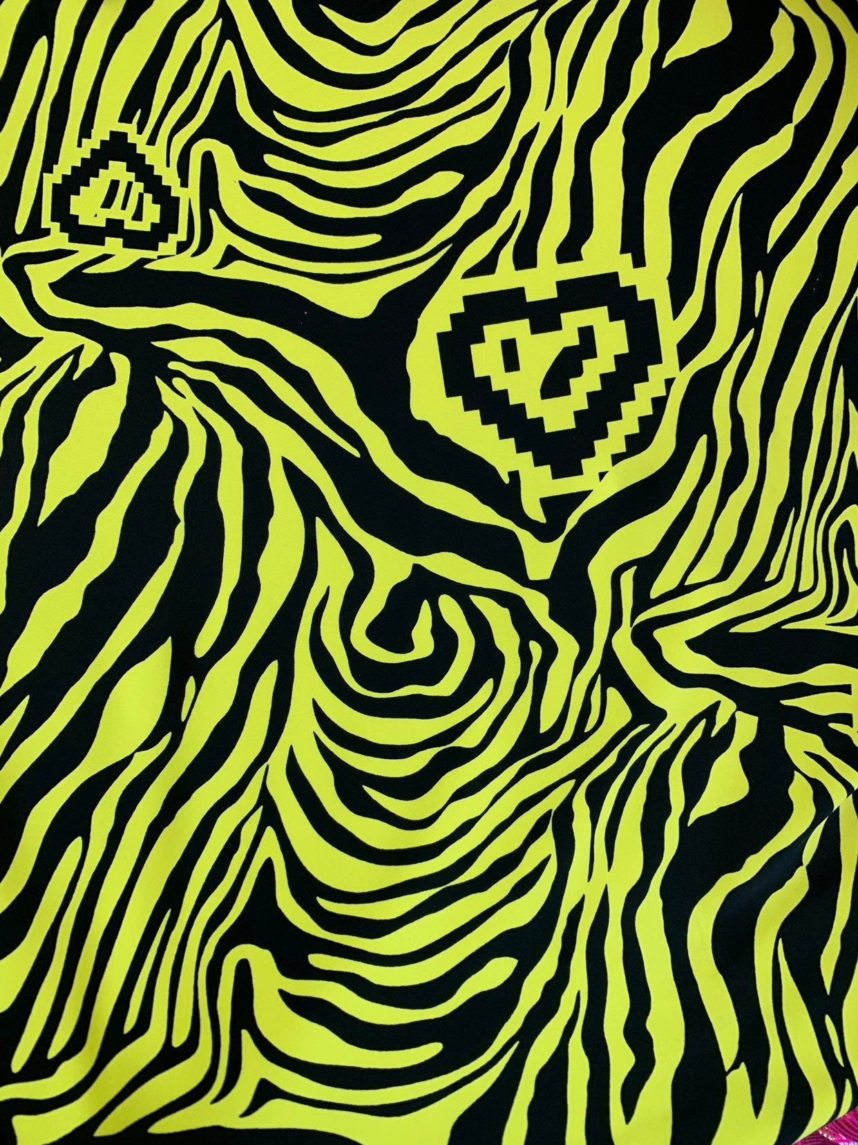 New zebra design black/yellow print on nylon spandex 4way stretch 58/60" Sold by the YD. Ships worldwide from Los Angeles California USA.