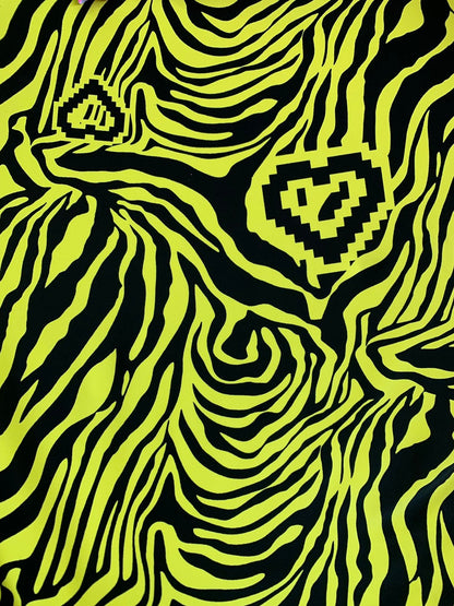 New zebra design black/yellow print on nylon spandex 4way stretch 58/60" Sold by the YD. Ships worldwide from Los Angeles California USA.