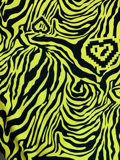 New zebra design black/yellow print on nylon spandex 4way stretch 58/60" Sold by the YD. Ships worldwide from Los Angeles California USA.