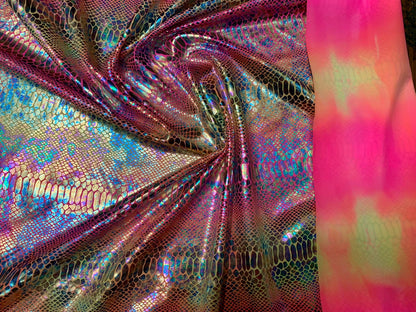 New Iridescent hologram snake design with clear multicolor foil 4way stretch 58/60" Sold by the YD. Ships worldwide from Los Angeles CA USA.