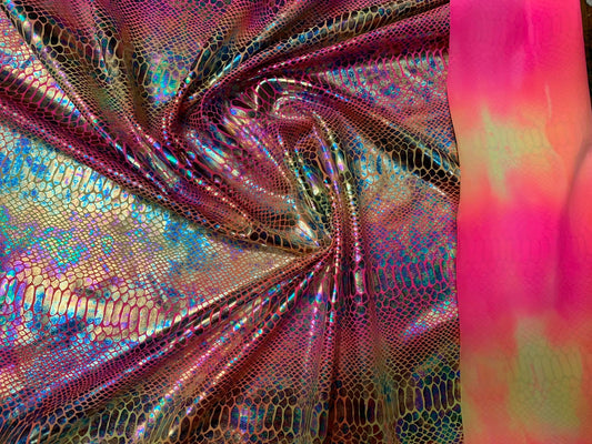 New Iridescent hologram snake design with clear multicolor foil 4way stretch 58/60" Sold by the YD. Ships worldwide from Los Angeles CA USA.