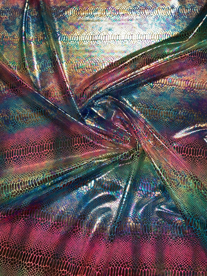 New Iridescent rainbow hologram snake design with tie dye ilusión foil 4way stretch 58/60" Sold by the YD. Ships worldwide from Los Angeles