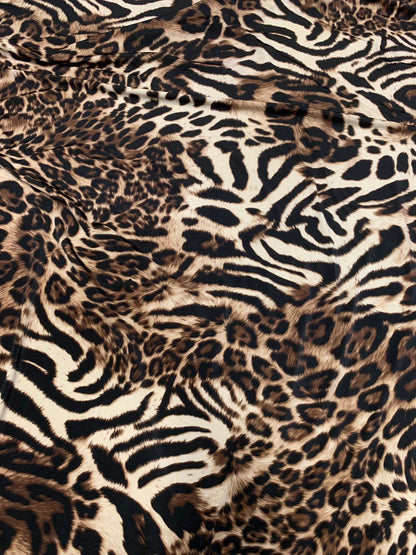 New exotic leopard animal print brown/taupe 4way stretch Nylon spandex 58/60" Sold by the YD. Ships worldwide from Los Angeles California.