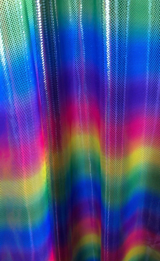 New metallic rainbow design with silver dots nylon spandex 4way stretch 58/60" Sold by the YD. Ships worldwide from Los Angeles California.