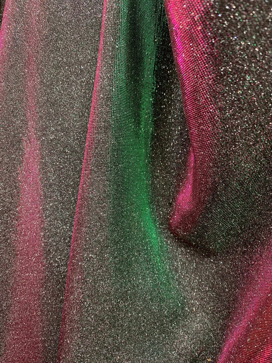 New Iridescent heavy metallic poly super techno fabric 4 way stretch 58/60" Sold by the YD. Ships worldwide from Los Angeles California USA.