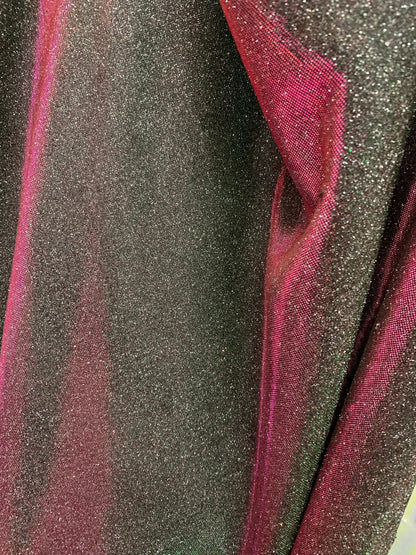 New Iridescent heavy metallic poly super techno fabric 4 way stretch 58/60" Sold by the YD. Ships worldwide from Los Angeles California USA.