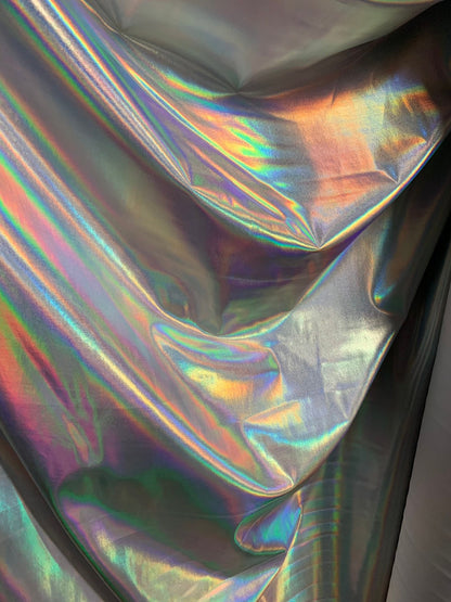 NEW Iridescent all over foil on nylon spandex 4way stretch 58/60" Shining Iridescent foil white/silver Sold by the YD. Ships worldwide.