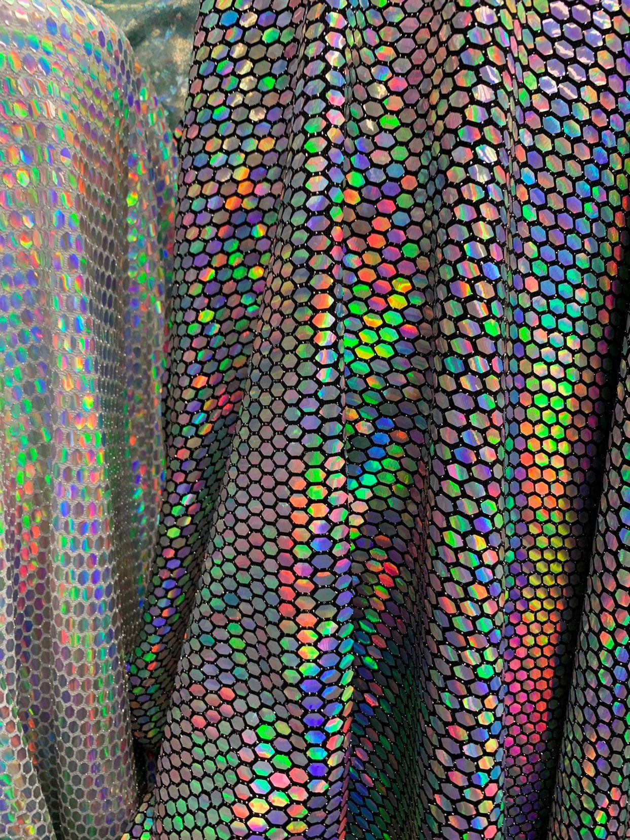 New Geometric iridescent sequins metallic base 4-way stretch 58/60" Sold by the YD. Ships worldwide from Los Angeles California USA.