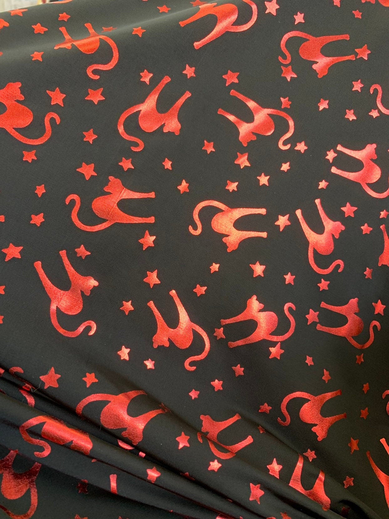 New Halloween cat design Metallic spandex 4way stretch 58/60" Sold by the YD. Ships worldwide from Los Angeles California USA.