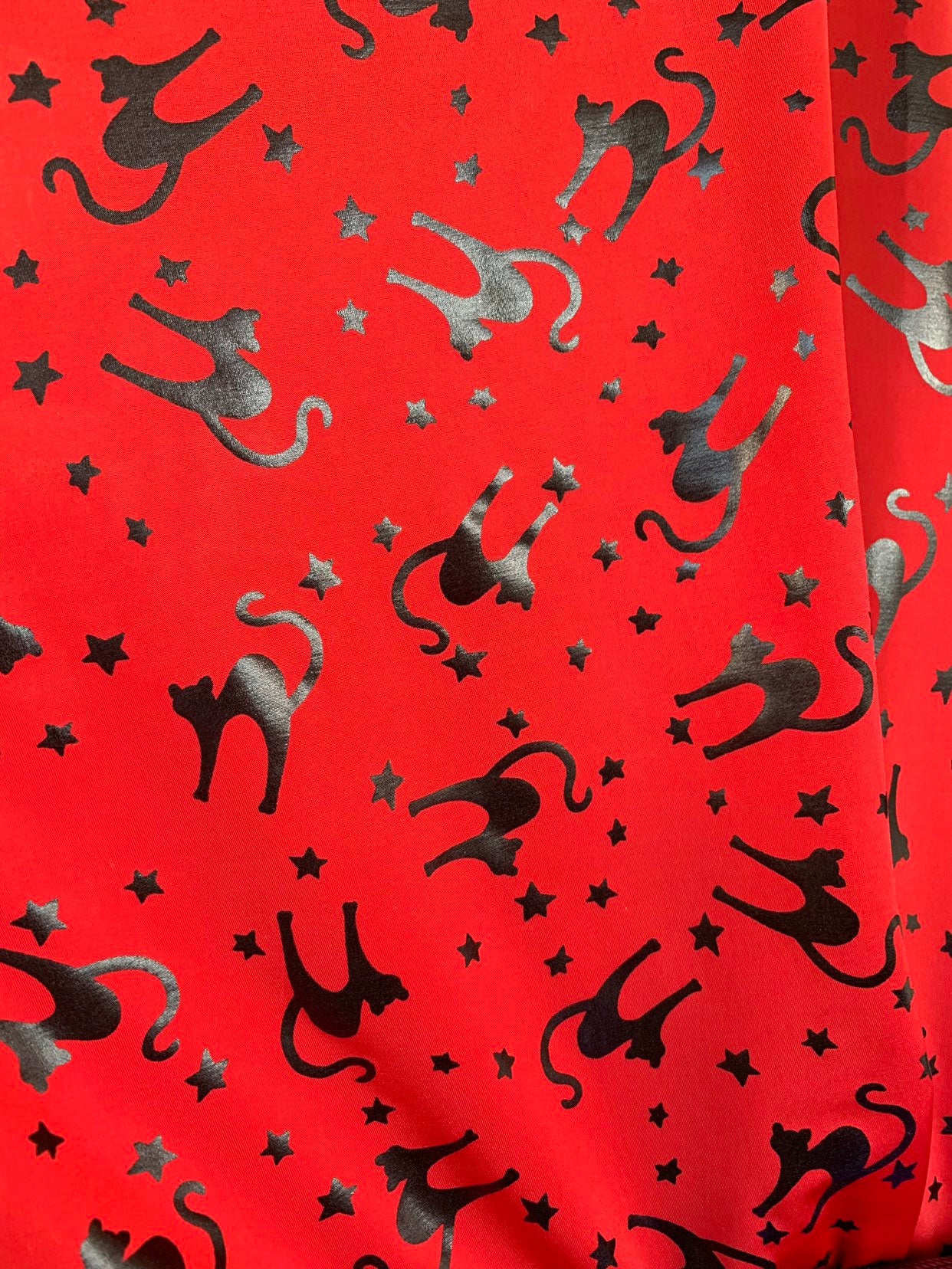 New Halloween cat design Metallic spandex 4way stretch 58/60" Sold by the YD. Ships worldwide from Los Angeles California USA.