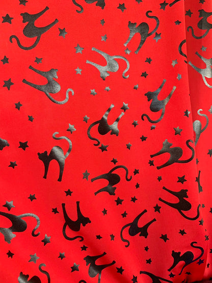 New Halloween cat design Metallic spandex 4way stretch 58/60" Sold by the YD. Ships worldwide from Los Angeles California USA.