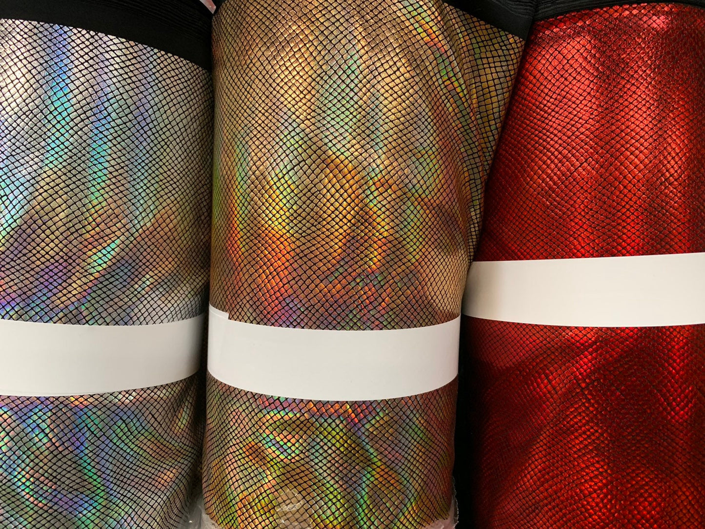 New dragon scales iridescent hologram foil on nylon spandex 4way stretch 58/60" Sold by the YD. Ships worldwide from Los Angeles California.