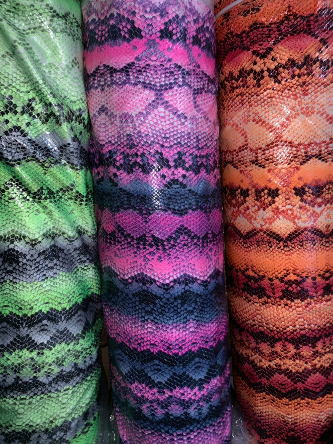 New exotic snake design poly spandex 4-way stretch with clear foil 58/60" Sold by the YD. Ships worldwide from Los Angeles California USA.
