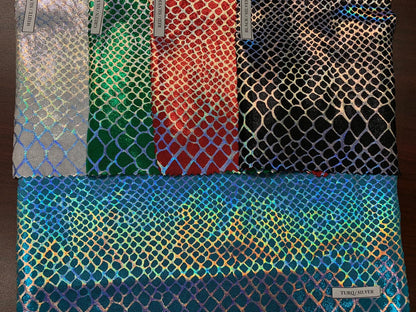 Dragón design Iridescent two tone hologram metallic nylon spandex 4way stretch 58/60" Sold by the YD. Ships worldwide from Los Angeles CA.