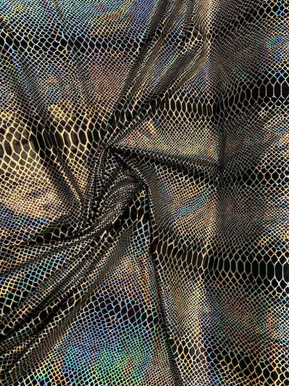 Dragón design Iridescent two tone hologram metallic nylon spandex 4way stretch 58/60" Sold by the YD. Ships worldwide from Los Angeles CA.