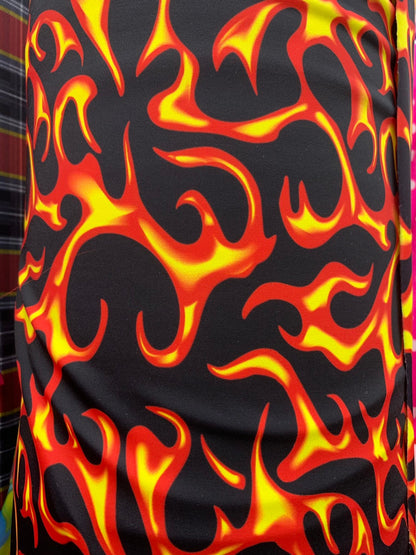 Hot flame design black/red print on heavy nylon spandex 4way stretch 58/60" Sold by the YD. Ships worldwide from Los Angeles California USA.