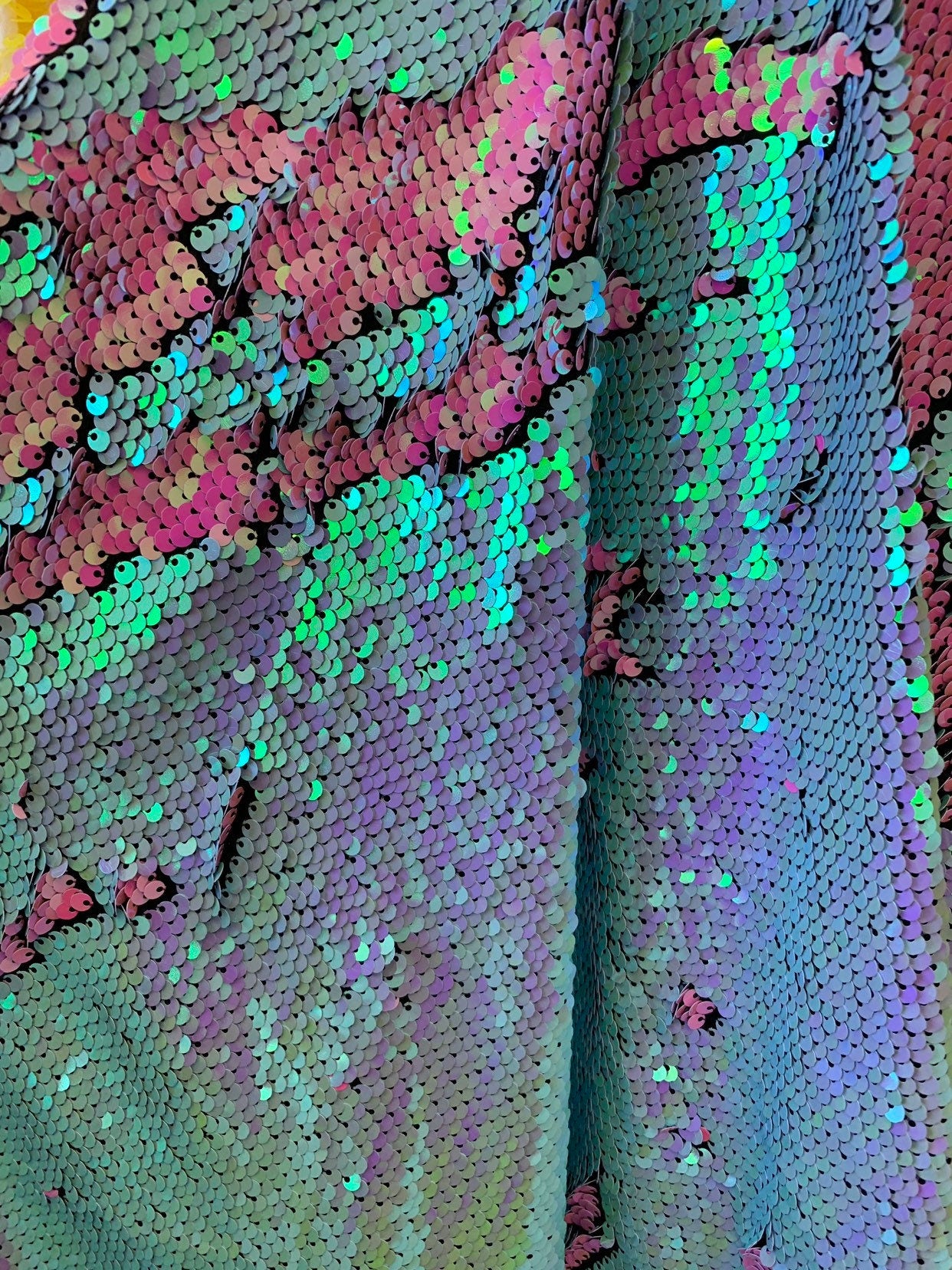 New flip up mermaid reversible sequins iridescent colors on spandex base 58/60" Sold by the YD. Ships worldwide from Los Angeles California