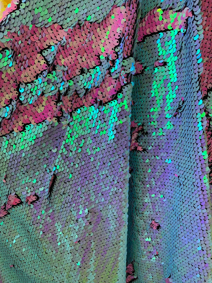 New flip up mermaid reversible sequins iridescent colors on spandex base 58/60" Sold by the YD. Ships worldwide from Los Angeles California