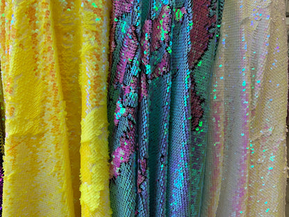 New flip up mermaid reversible sequins iridescent colors on spandex base 58/60" Sold by the YD. Ships worldwide from Los Angeles California
