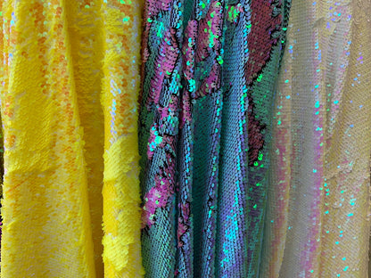 New flip up mermaid reversible sequins iridescent colors on spandex base 58/60" Sold by the YD. Ships worldwide from Los Angeles California
