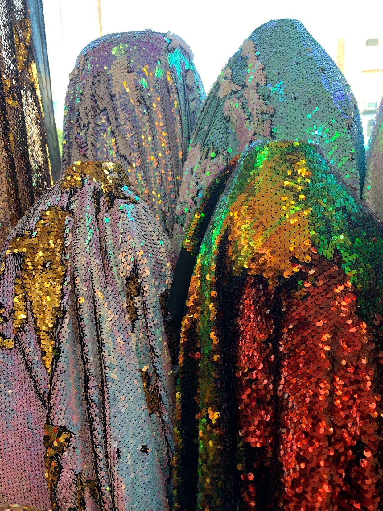 Mermaid iridescent sequins 2tone reversible sequins on spandex base 2-way stretch 58/60" Sold by the YD. Ships worldwide from Los Angeles CA