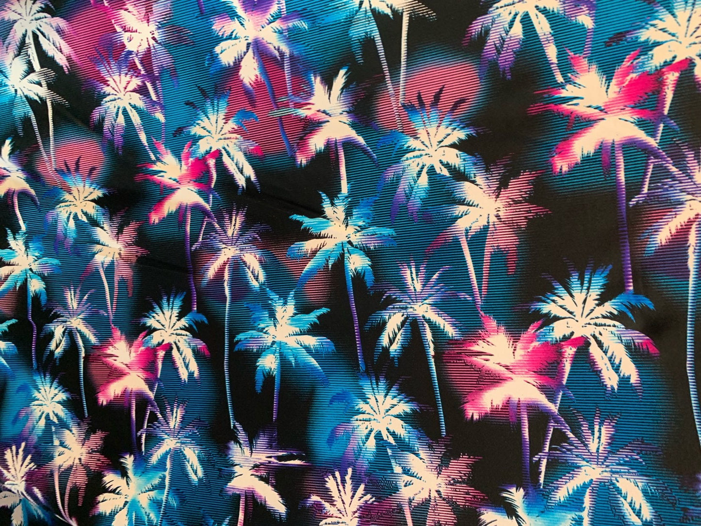 New tropical palm tree design print on nylon spandex 4way stretch 58/60" Sold by the YD. Ships worldwide from Los Angeles California USA.