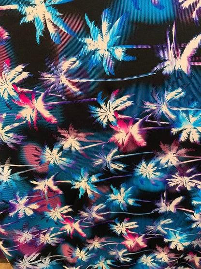 New tropical palm tree design print on nylon spandex 4way stretch 58/60" Sold by the YD. Ships worldwide from Los Angeles California USA.