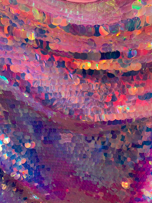 New iridescent pink sequins big paillette seq on stretch mesh 2-way 58/60" Sold by the YD. Ships worldwide from Los Angeles California USA.