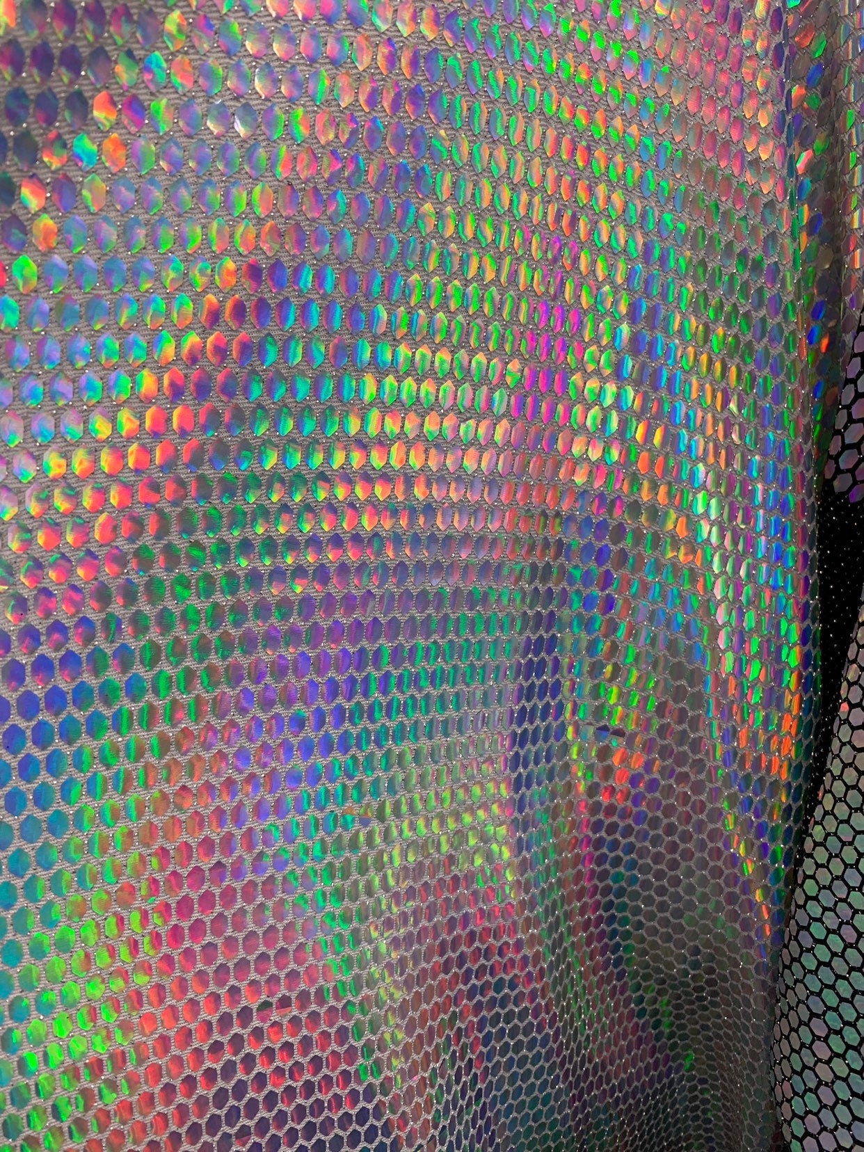 New Geometric iridescent sequins metallic base 4-way stretch 58/60" Sold by the YD. Ships worldwide from Los Angeles California USA.