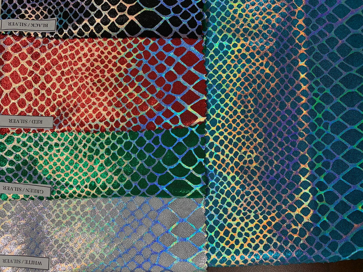 Dragón design Iridescent two tone hologram metallic nylon spandex 4way stretch 58/60" Sold by the YD. Ships worldwide from Los Angeles CA.