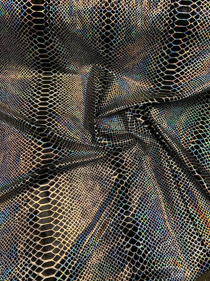 Dragón design Iridescent two tone hologram metallic nylon spandex 4way stretch 58/60" Sold by the YD. Ships worldwide from Los Angeles CA.