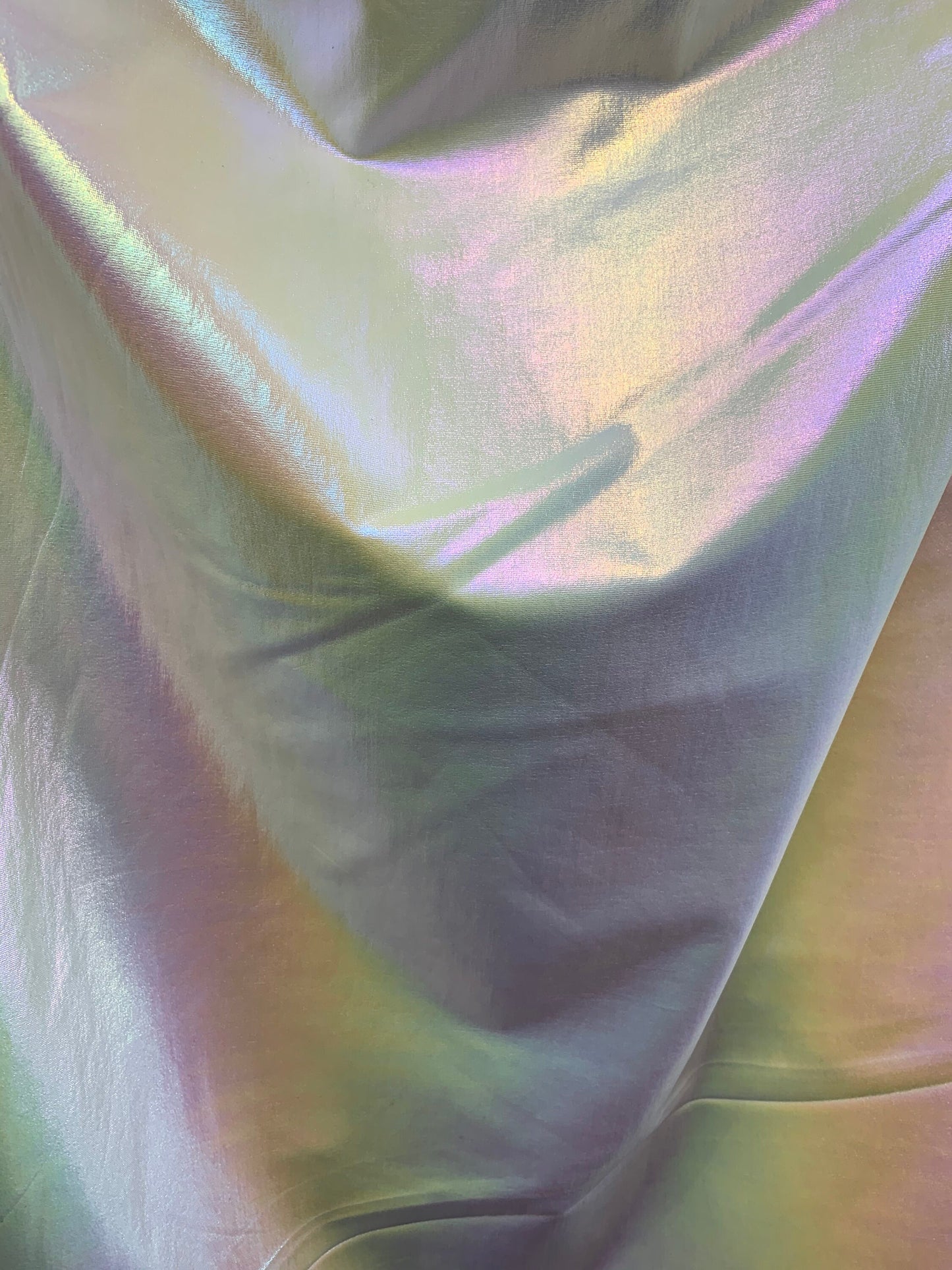 New Lacer Foil Iridescent White Unicorn Metallic Spandex 4-Way 58/60" Sold By The YD. Ships Worldwide From Los Ángeles California USA.