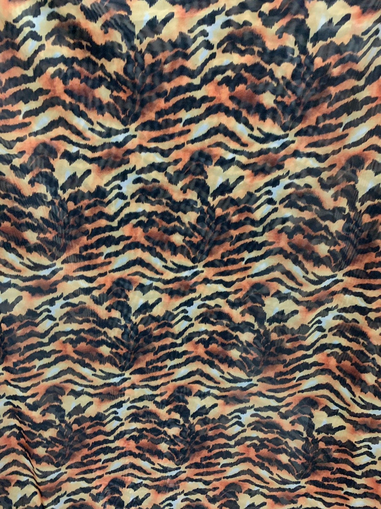 New Tiger Exotic design print on chiffon non stretch 58/60" Sold by the YD. Ships worldwide from Los Angeles California USA.