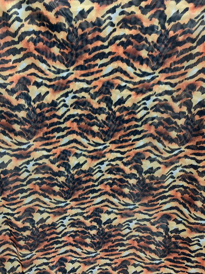 New Tiger Exotic design print on chiffon non stretch 58/60" Sold by the YD. Ships worldwide from Los Angeles California USA.