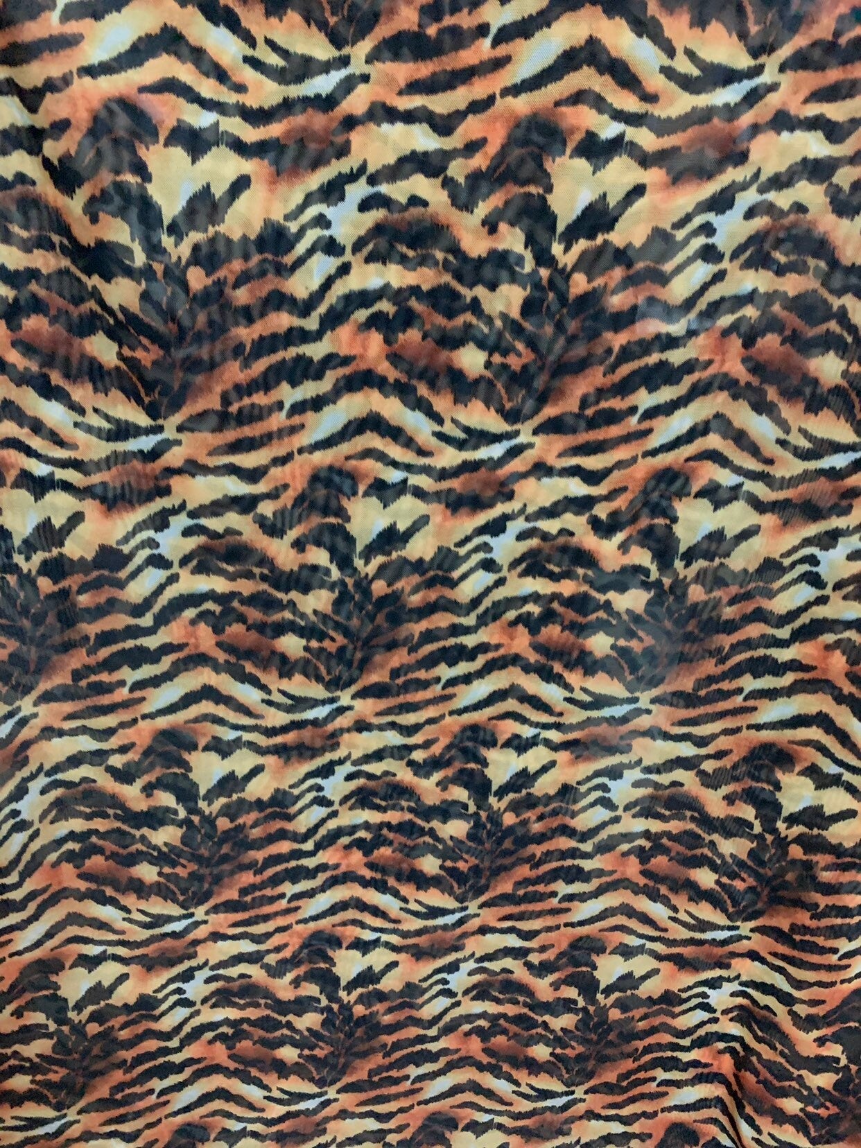 New Tiger Exotic design print on chiffon non stretch 58/60" Sold by the YD. Ships worldwide from Los Angeles California USA.