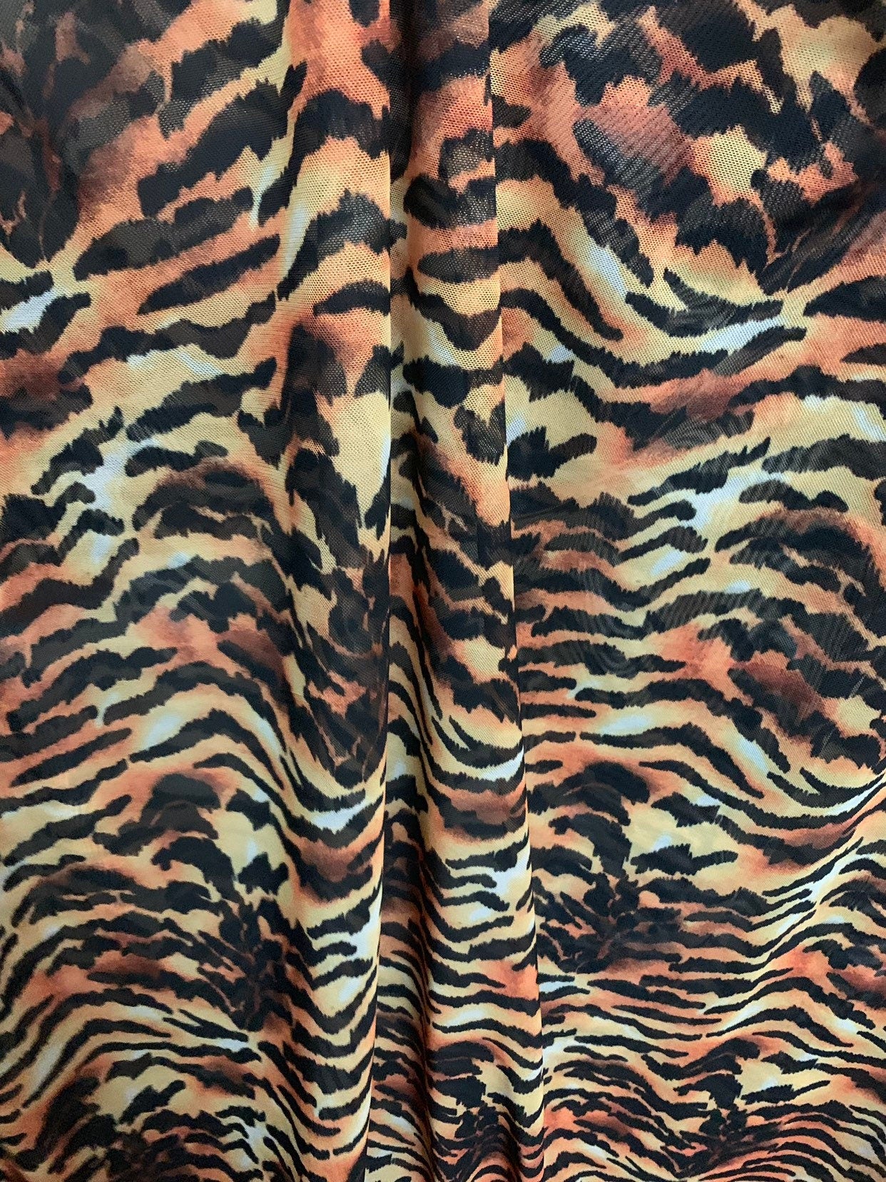New Tiger Exotic design print on chiffon non stretch 58/60" Sold by the YD. Ships worldwide from Los Angeles California USA.
