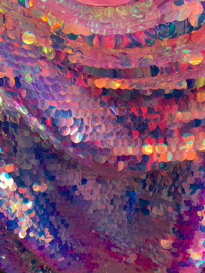 New iridescent pink sequins big paillette seq on stretch mesh 2-way 58/60" Sold by the YD. Ships worldwide from Los Angeles California USA.