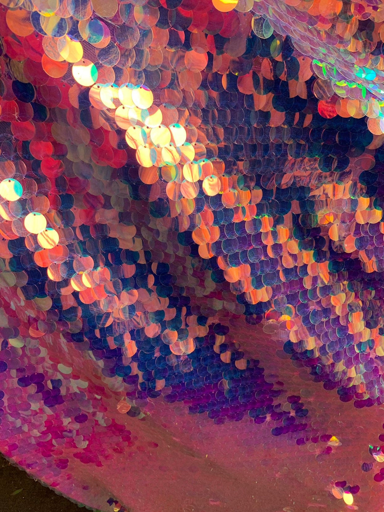 New iridescent pink sequins big paillette seq on stretch mesh 2-way 58/60" Sold by the YD. Ships worldwide from Los Angeles California USA.