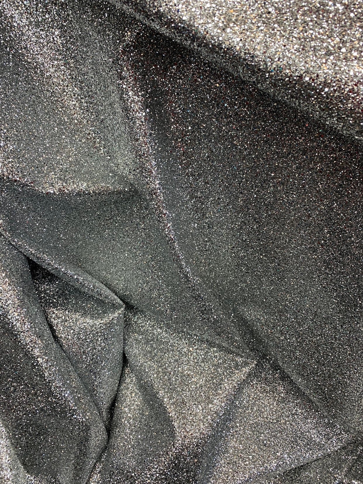 New denim fabric non stretch with silver metallic glitter all over 58/60" Sold by the YD. Ships worldwide from Los Angeles California USA.