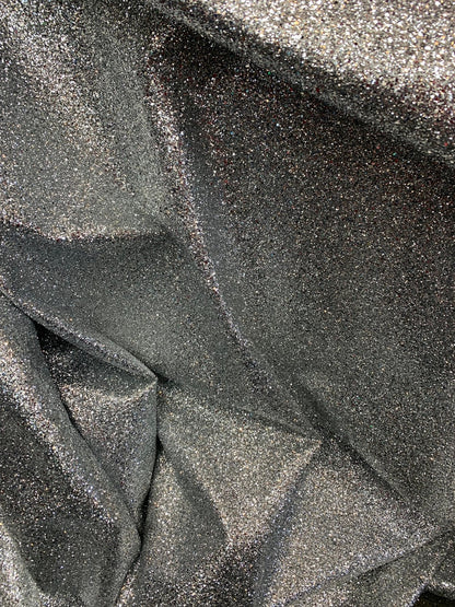 New denim fabric non stretch with silver metallic glitter all over 58/60" Sold by the YD. Ships worldwide from Los Angeles California USA.