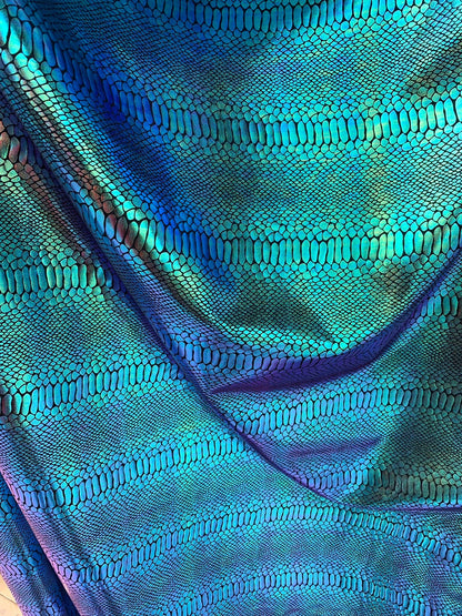 New Iridescent snake foil 2 tone blue/green metallic nylon spandex 4way stretch 58/60" Sold by the  YD. Ships worldwide from Los Angeles CA.