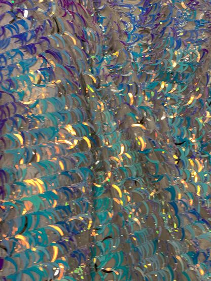 New  Iridescent sequins half moon design on stretch mesh 2-way 58/60” Sold by the YD. Ships worldwide from Los Angeles California USA.