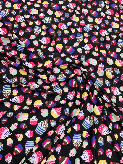 New cupcakes design print on nylon spandex finest quality 4-way stretch 58/60” Sold by the YD. Ships worldwide from Los Angeles California.