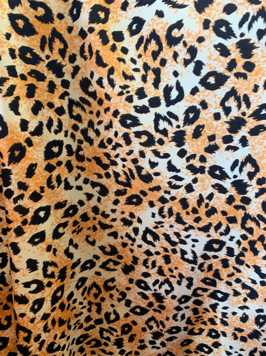 Cheetah design animal print on nylon spandex 4way Stretch 58/60" Sold by the YD. Ships worldwide from Los Angeles California USA