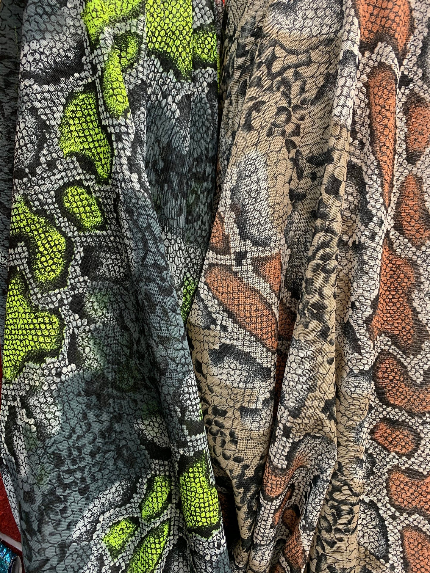 New stretch mesh exotic snake design it glows in the dark 4-way Stretch 58/60” Sold by the YD. Ships worldwide from Los Ángeles California