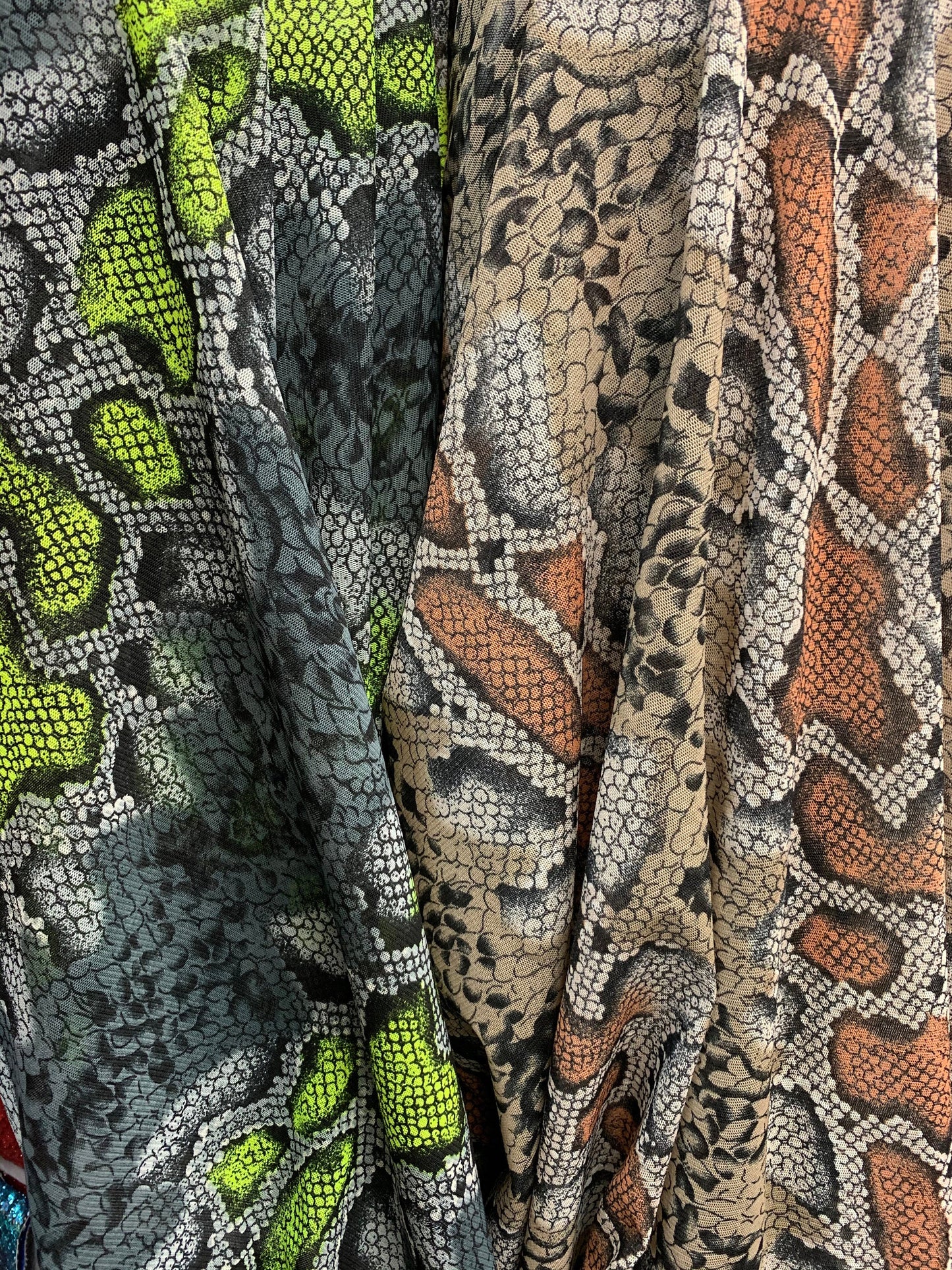 New stretch mesh exotic snake design it glows in the dark 4-way Stretch 58/60” Sold by the YD. Ships worldwide from Los Ángeles California
