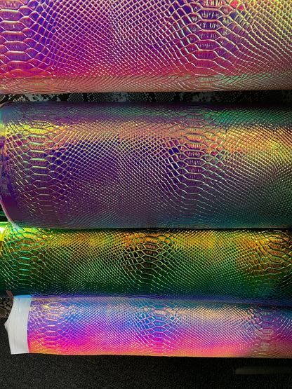 New Alligator design iridescent vinyl non stretch 58/60” Sold by the YD. Ships worldwide from Los Ángeles California USA.