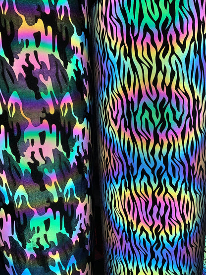 New reflective rainbow zebra and camouflage design on super techno heavy fabric 2-way Stretch 58/60” Sold by the YD. Ships worldwide.