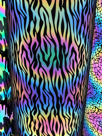 New reflective rainbow zebra and camouflage design on super techno heavy fabric 2-way Stretch 58/60” Sold by the YD. Ships worldwide.