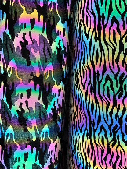 New reflective rainbow zebra and camouflage design on super techno heavy fabric 2-way Stretch 58/60” Sold by the YD. Ships worldwide.